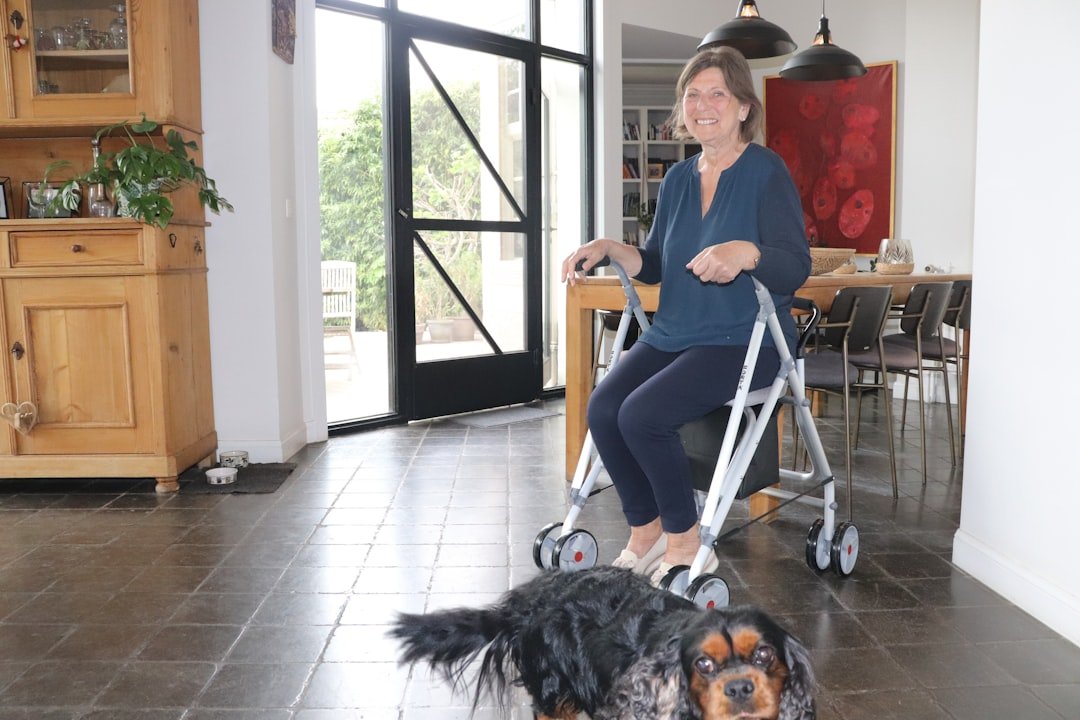 A person using a walker in a cozy home environment, demonstrating safe mobility.