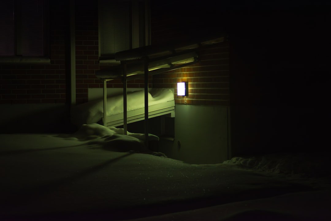 A close-up of a bed with safety rails installed, emphasizing comfort and security for nighttime movement.